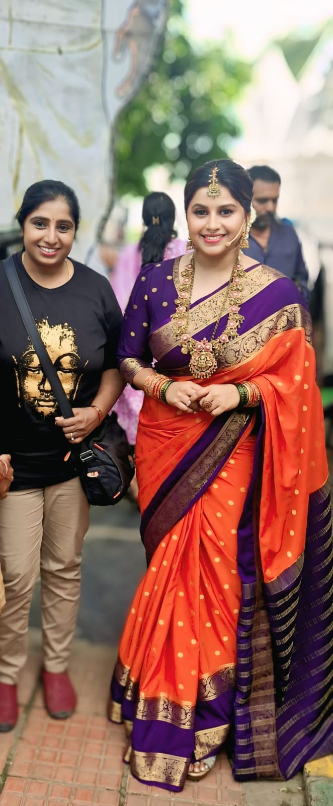 Reception look in orange saree